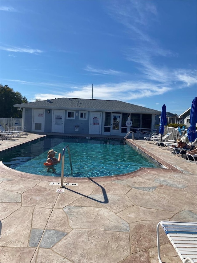 view of pool featuring a patio