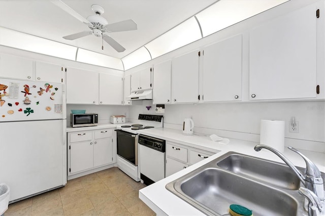 kitchen featuring under cabinet range hood, white appliances, a sink, white cabinets, and light countertops