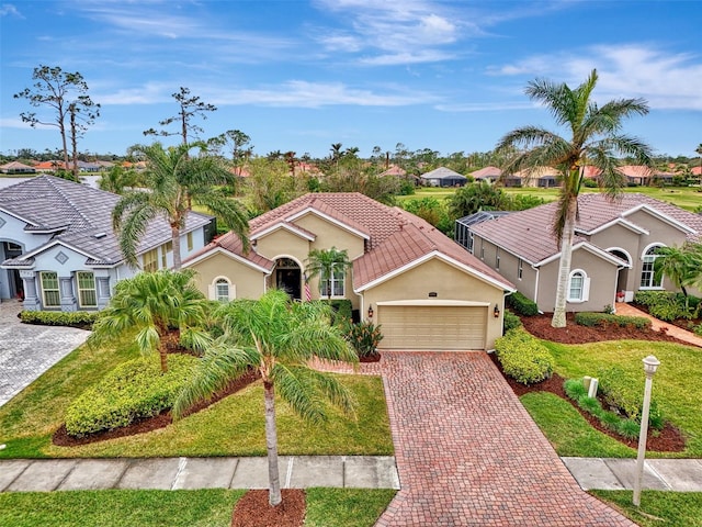 mediterranean / spanish-style home featuring a garage