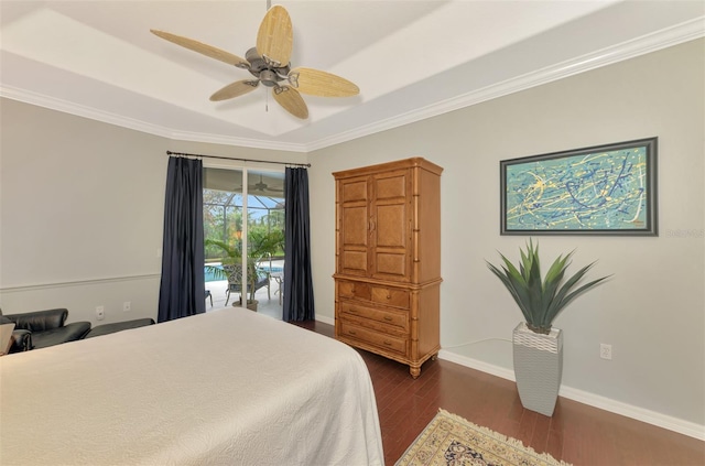 bedroom with access to exterior, dark wood-type flooring, ornamental molding, and ceiling fan