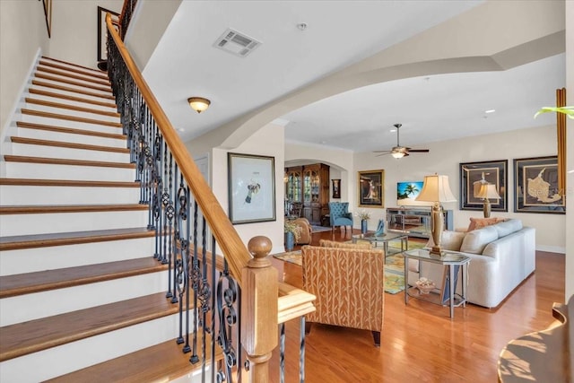 interior space featuring hardwood / wood-style floors and ceiling fan