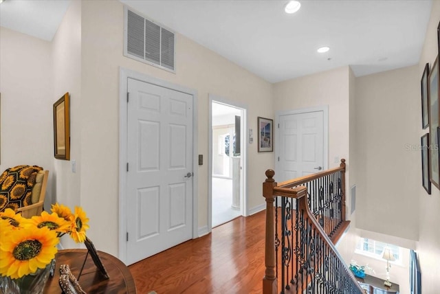 entryway with wood-type flooring