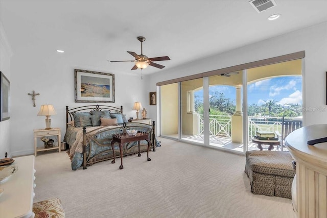 carpeted bedroom with access to exterior and ceiling fan