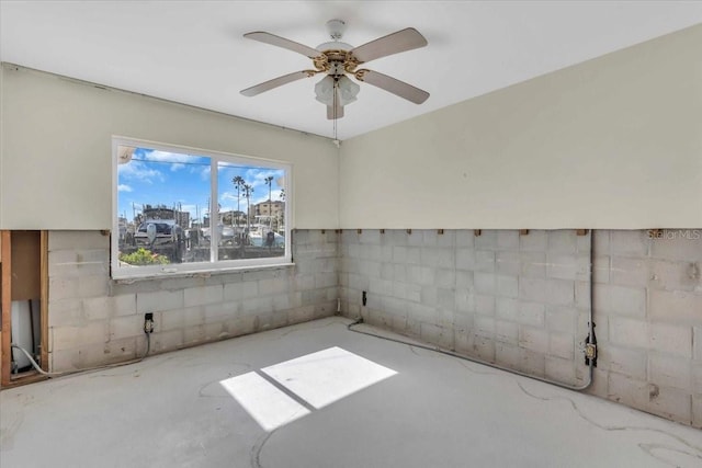 spare room with ceiling fan