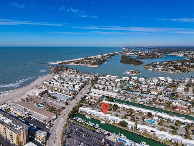 birds eye view of property featuring a water view and a view of the beach