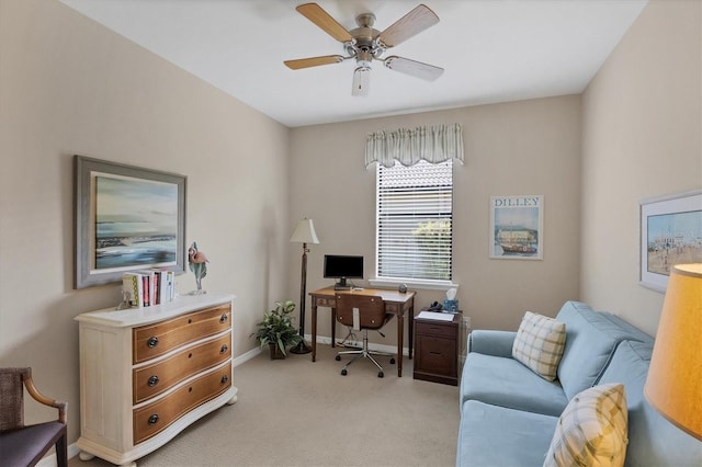 office with ceiling fan and light carpet