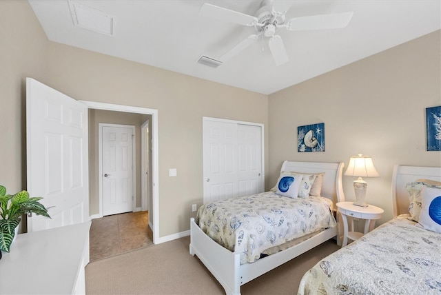 bedroom featuring carpet, ceiling fan, and a closet