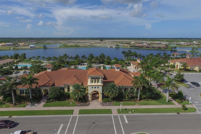 drone / aerial view with a water view