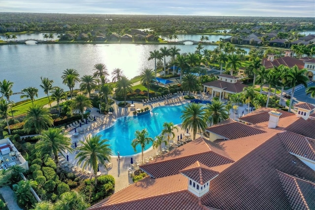 birds eye view of property featuring a water view