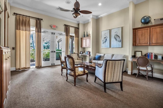 interior space with crown molding, dark carpet, french doors, and ceiling fan