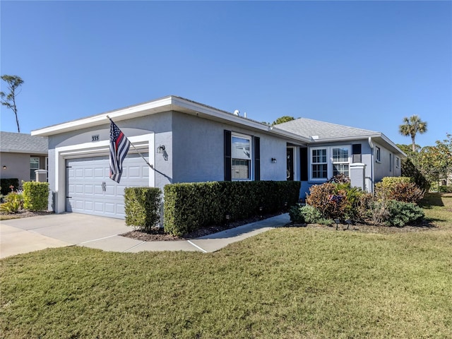 ranch-style home with a garage and a front yard