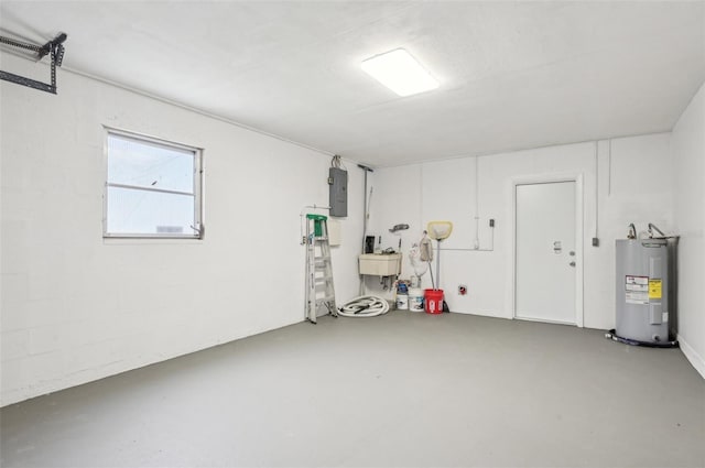 garage with electric panel and water heater