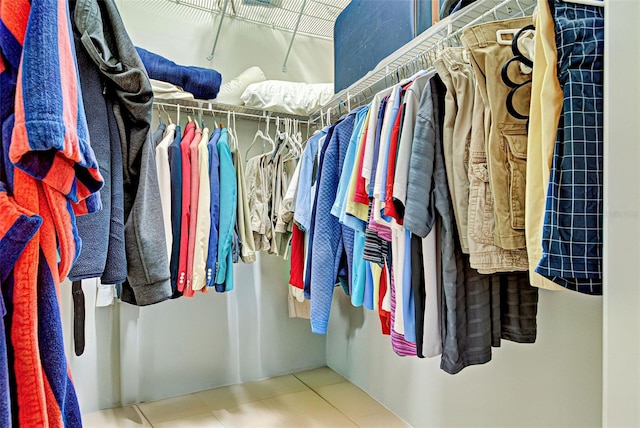 spacious closet with tile patterned flooring