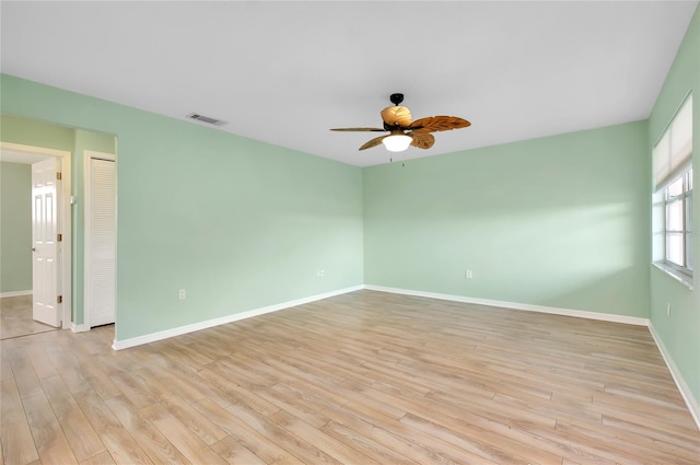 unfurnished room with ceiling fan and light hardwood / wood-style floors