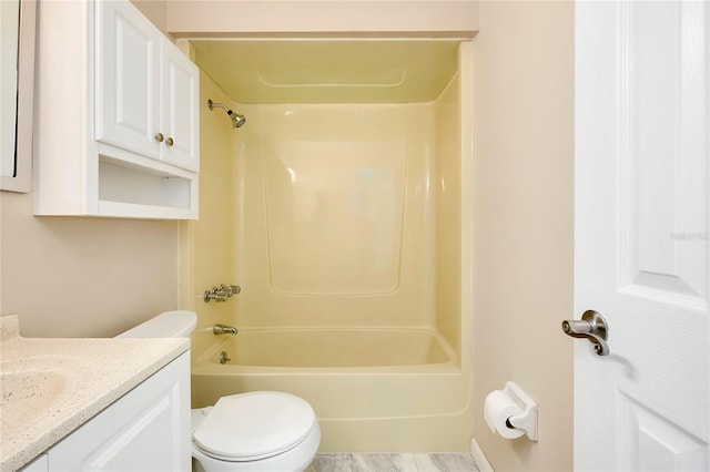 full bathroom with vanity, bathtub / shower combination, and toilet