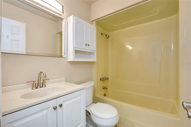 full bathroom with toilet, vanity, and shower / washtub combination