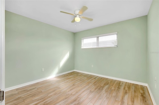 unfurnished room featuring ceiling fan and light hardwood / wood-style flooring