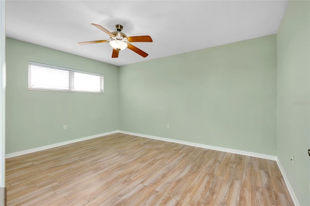 unfurnished room with ceiling fan and light hardwood / wood-style flooring