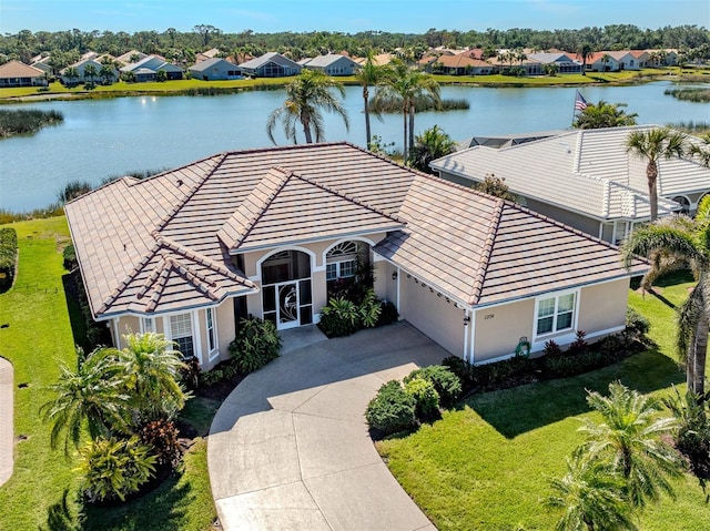 bird's eye view with a water view