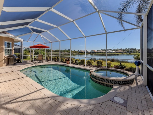 view of pool featuring a lanai, a water view, a patio area, grilling area, and an in ground hot tub