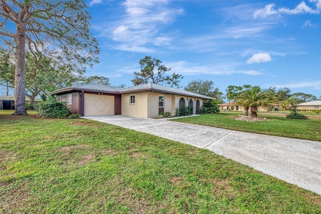 single story home with a garage and a front yard