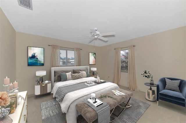 carpeted bedroom featuring ceiling fan