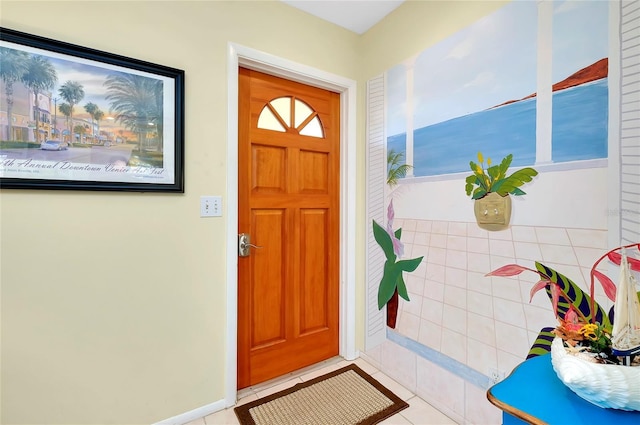 foyer with light tile patterned floors