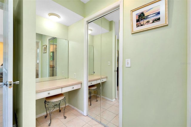 bathroom with tile patterned floors