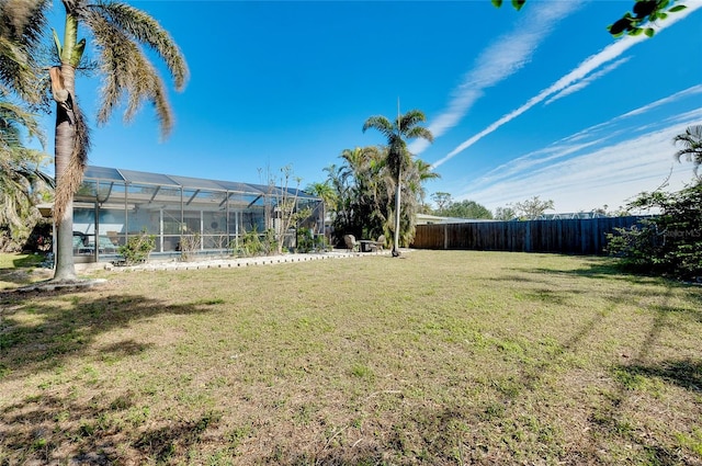 view of yard featuring a lanai