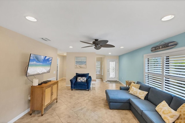 living room with ceiling fan