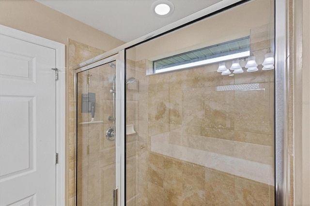 bathroom featuring an enclosed shower