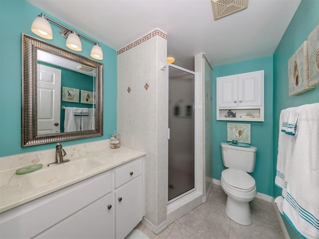 bathroom with vanity, an enclosed shower, tile patterned floors, and toilet