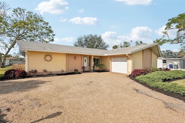 single story home with a garage