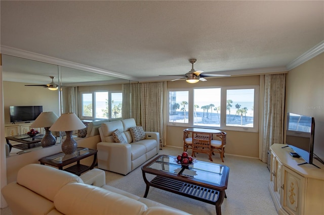 living room featuring crown molding, light colored carpet, a textured ceiling, and ceiling fan