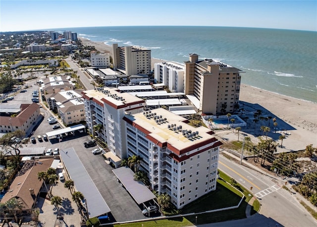 bird's eye view with a water view and a view of the beach