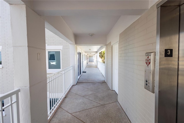 hallway featuring elevator