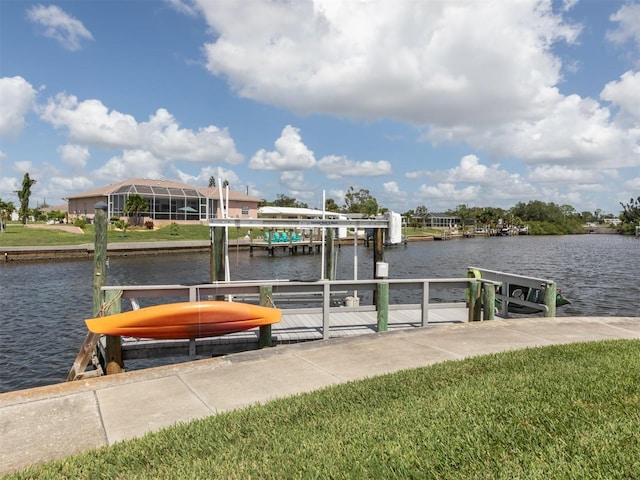 dock area featuring a water view and boat lift