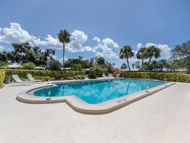 pool with a patio