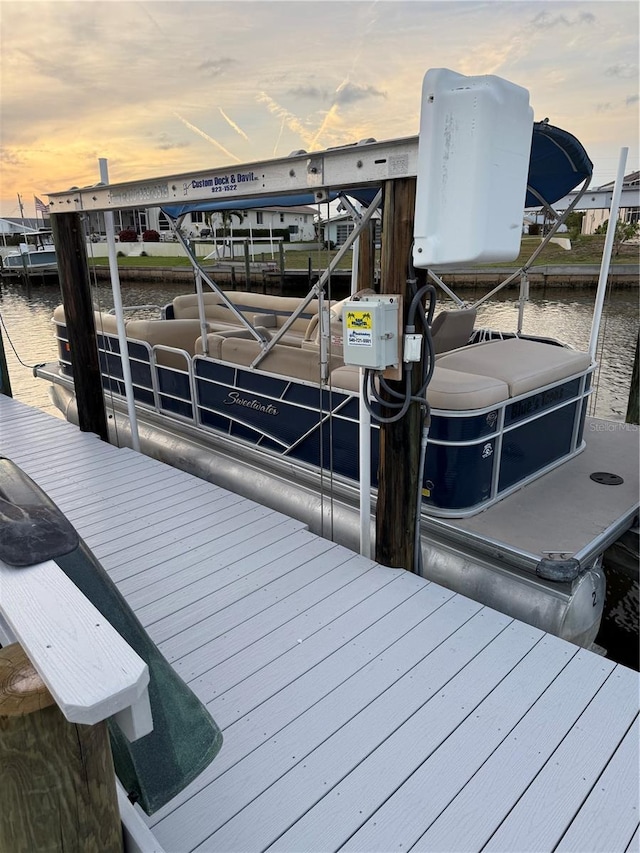 335 Englewood Isles Parkway Unit 55, Englewood, FL 34223 - dock with boat lift and a water view