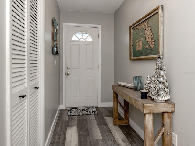 335 Englewood Isles Parkway Unit 55, Englewood, FL 34223 - entryway with wood finished floors and baseboards
