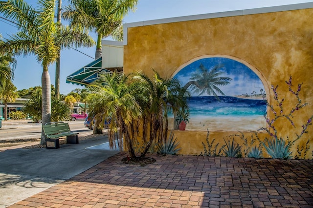 335 Englewood Isles Parkway Unit 55, Englewood, FL 34223 - exterior space with stucco siding and decorative driveway