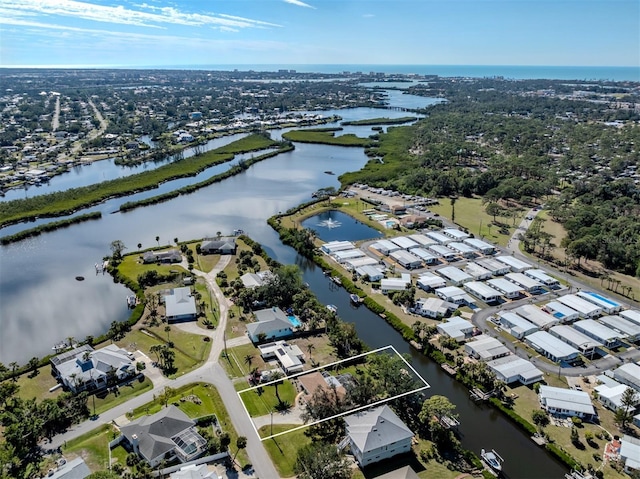 drone / aerial view with a water view