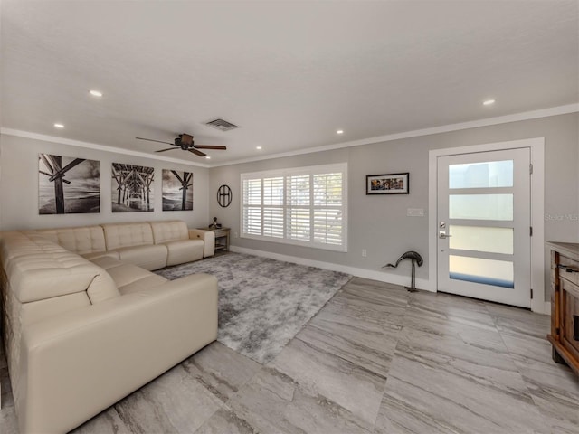 living room with crown molding and ceiling fan