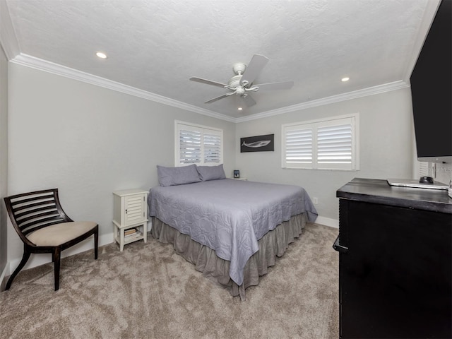 bedroom featuring crown molding, ceiling fan, light carpet, and a textured ceiling