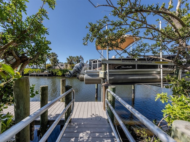 view of dock with a water view