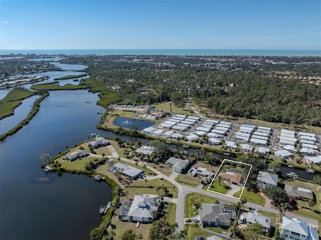 drone / aerial view featuring a water view