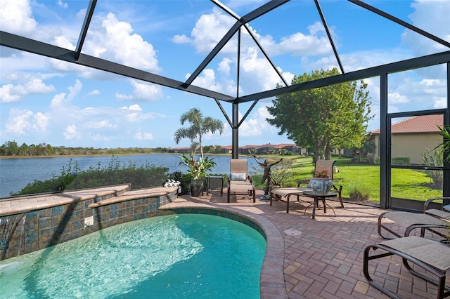 view of pool with a water view, a yard, a lanai, and a patio