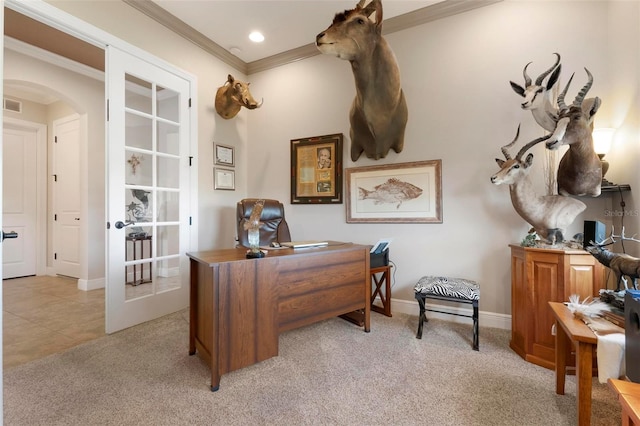 office with ornamental molding, light colored carpet, and french doors