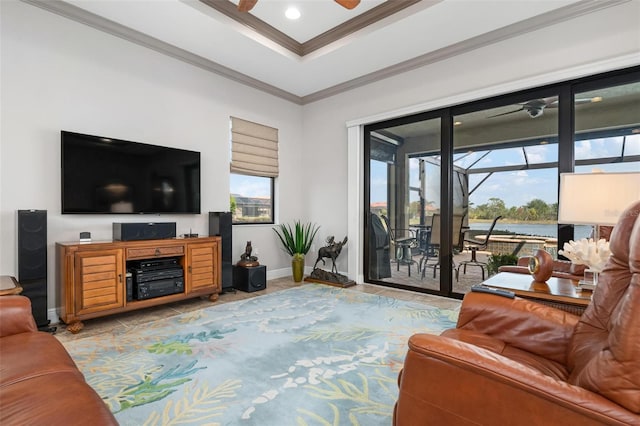 living room with crown molding and ceiling fan