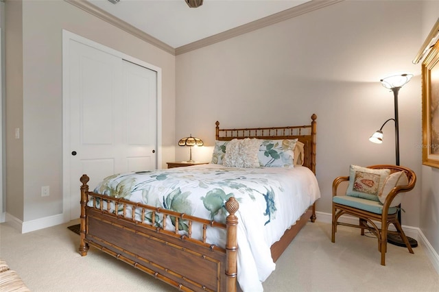 bedroom with light carpet, ornamental molding, and a closet